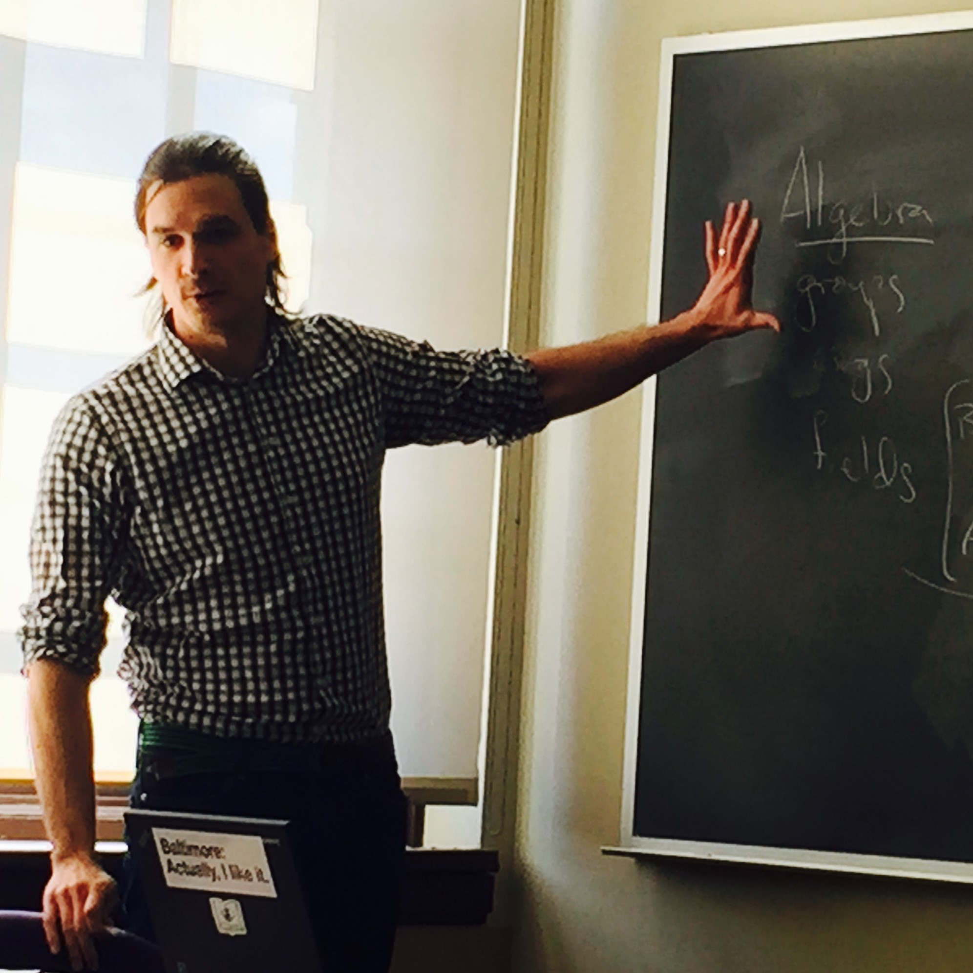 Jonathan Beardsley at chalk board